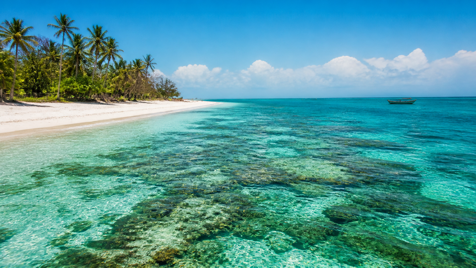 Clear turquoise water and white sand on Kenya's Indian Ocean coast